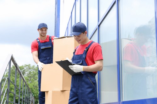 Man and van loading items for a Waterloo flat move