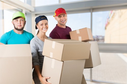 Professional movers handling office furniture during a Waterloo business move