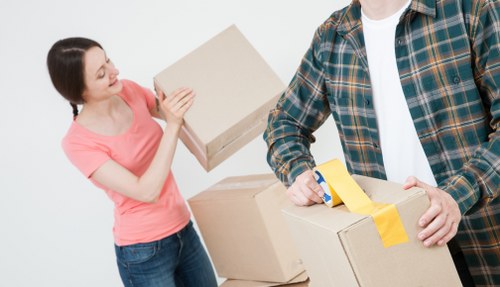 Piano movers protecting floors and property during a Waterloo removal