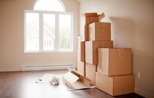 Professional Waterloo movers loading furniture into a moving truck