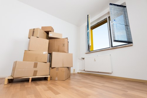 Labelled boxes and organised office furniture ready for moving day in Waterloo