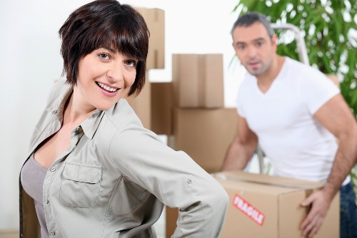 Packed household boxes and furniture prepared for Waterloo relocation